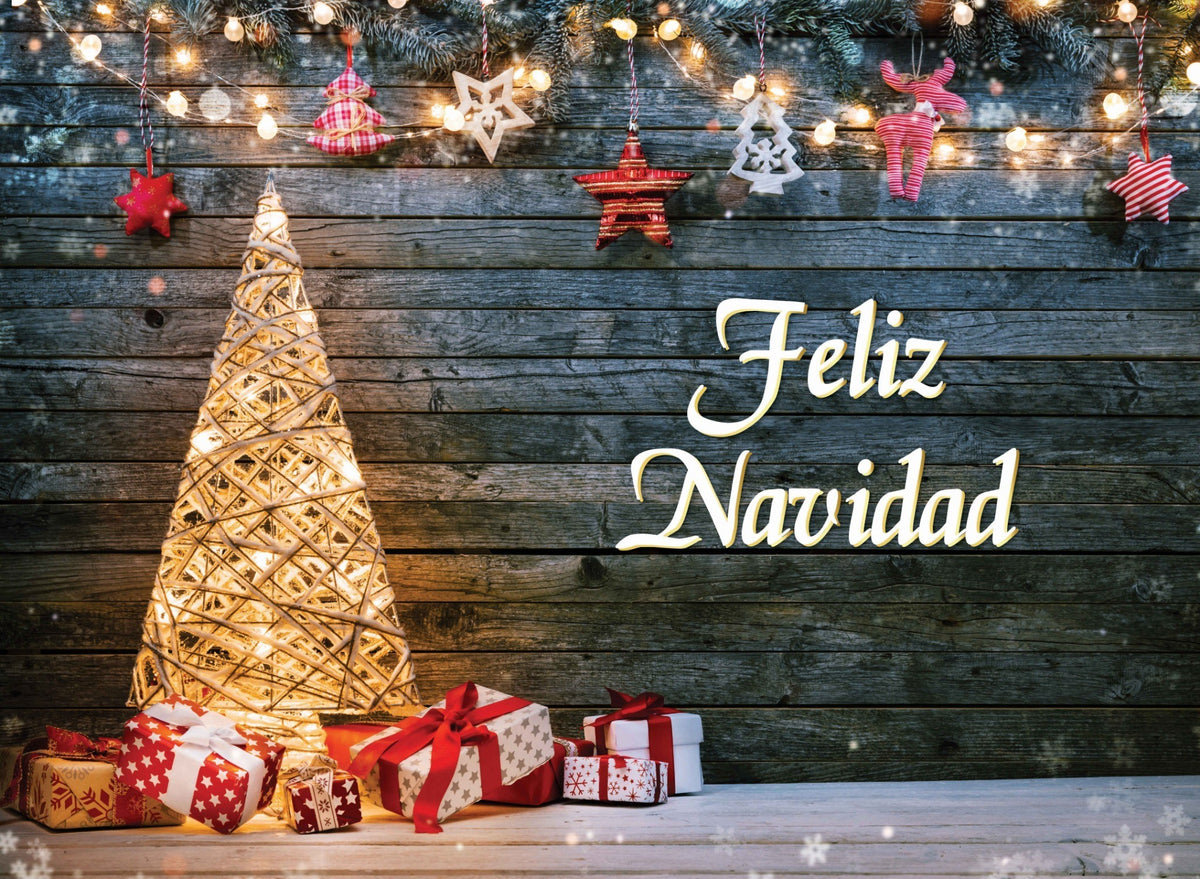 Decorative Christmas scene with a lit tree, presents, and 'Feliz Navidad' sign on a wooden background.