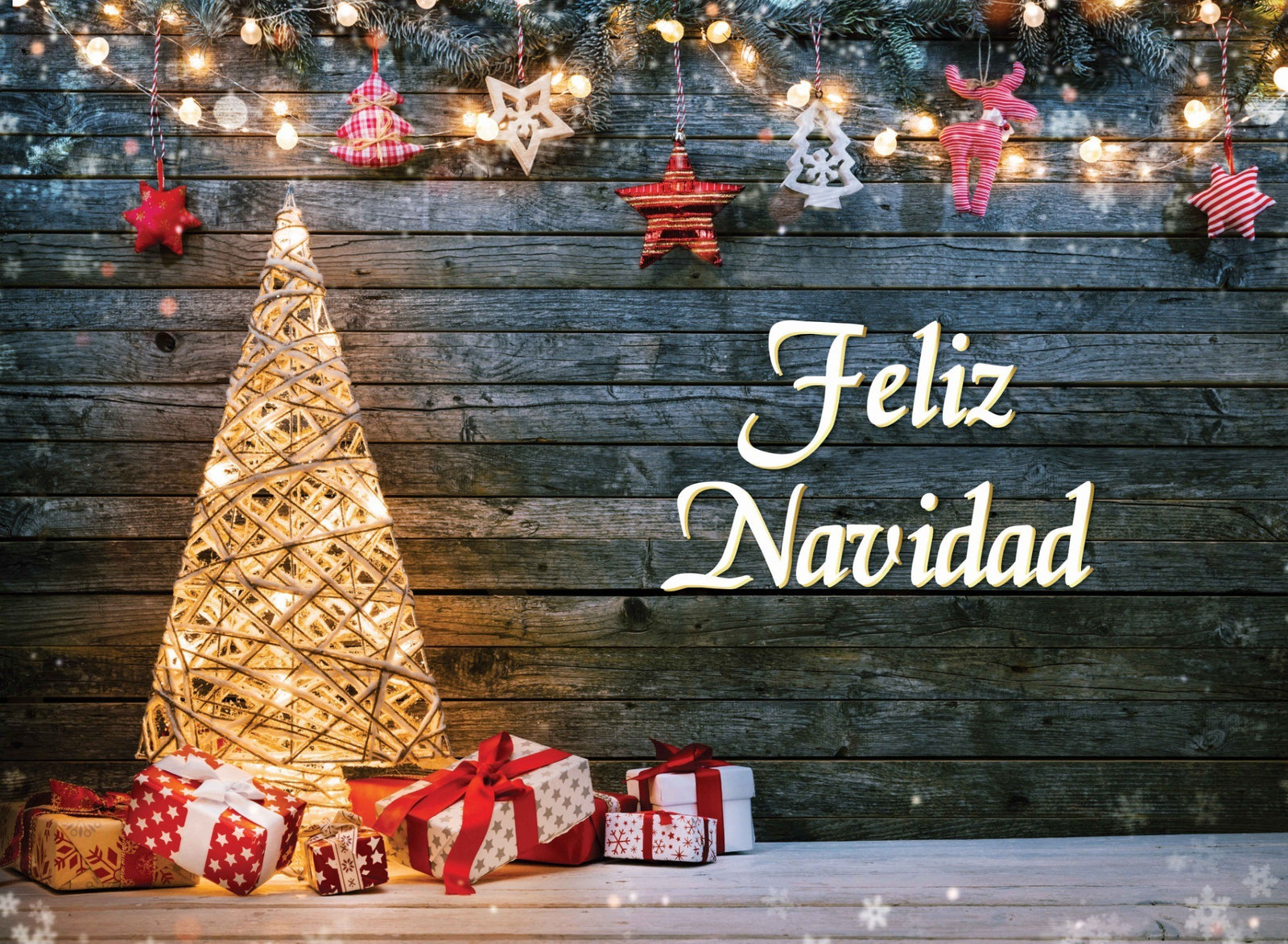 Decorative Christmas scene with a lit tree, presents, and 'Feliz Navidad' sign on a wooden background.